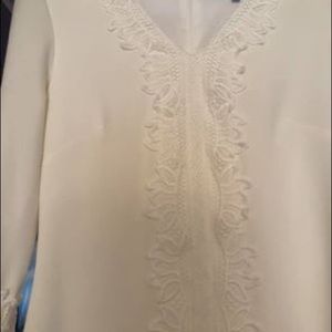 White Dress with Bell Sleeves and Crochet Detail